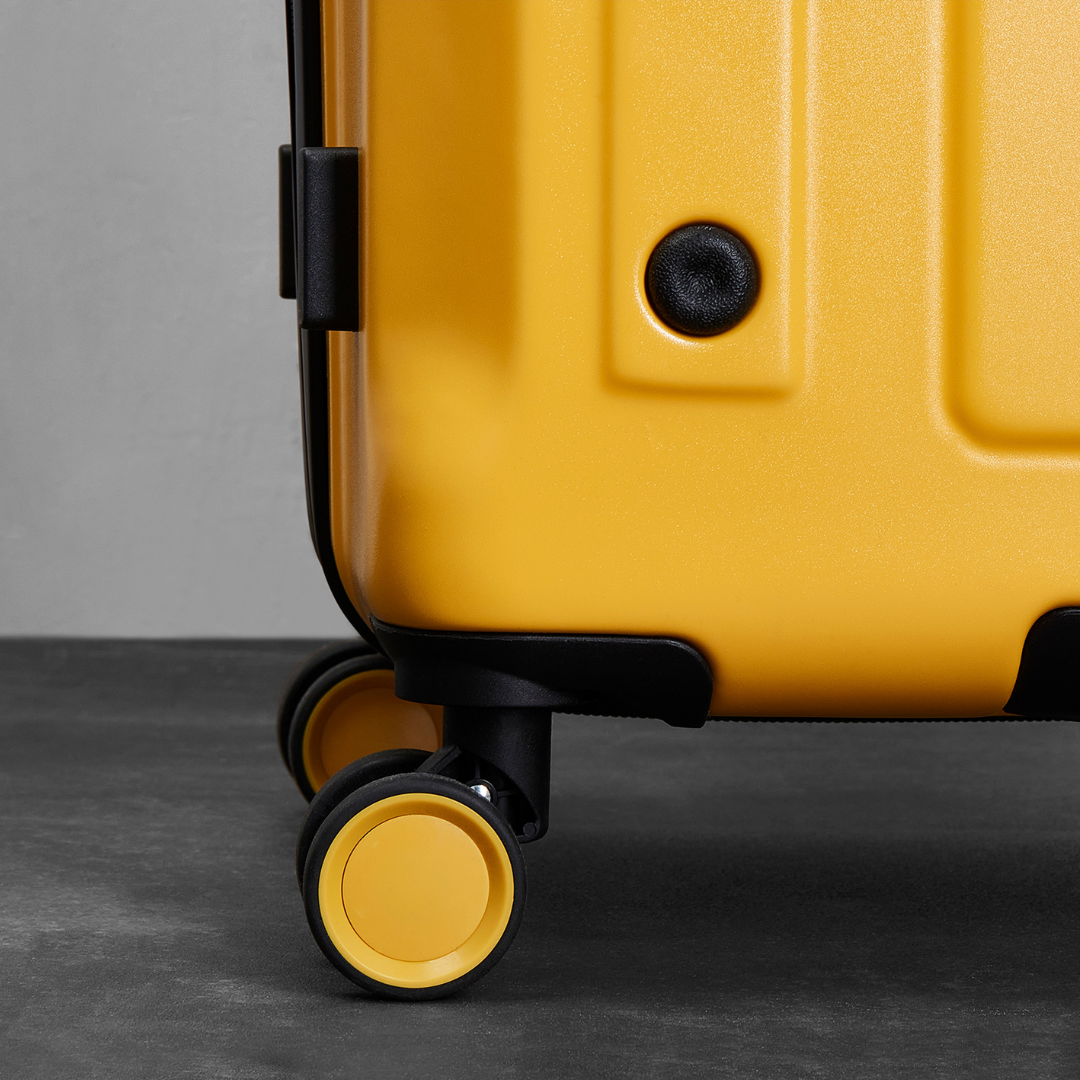 Alpine Medium Suitcase in Yellow