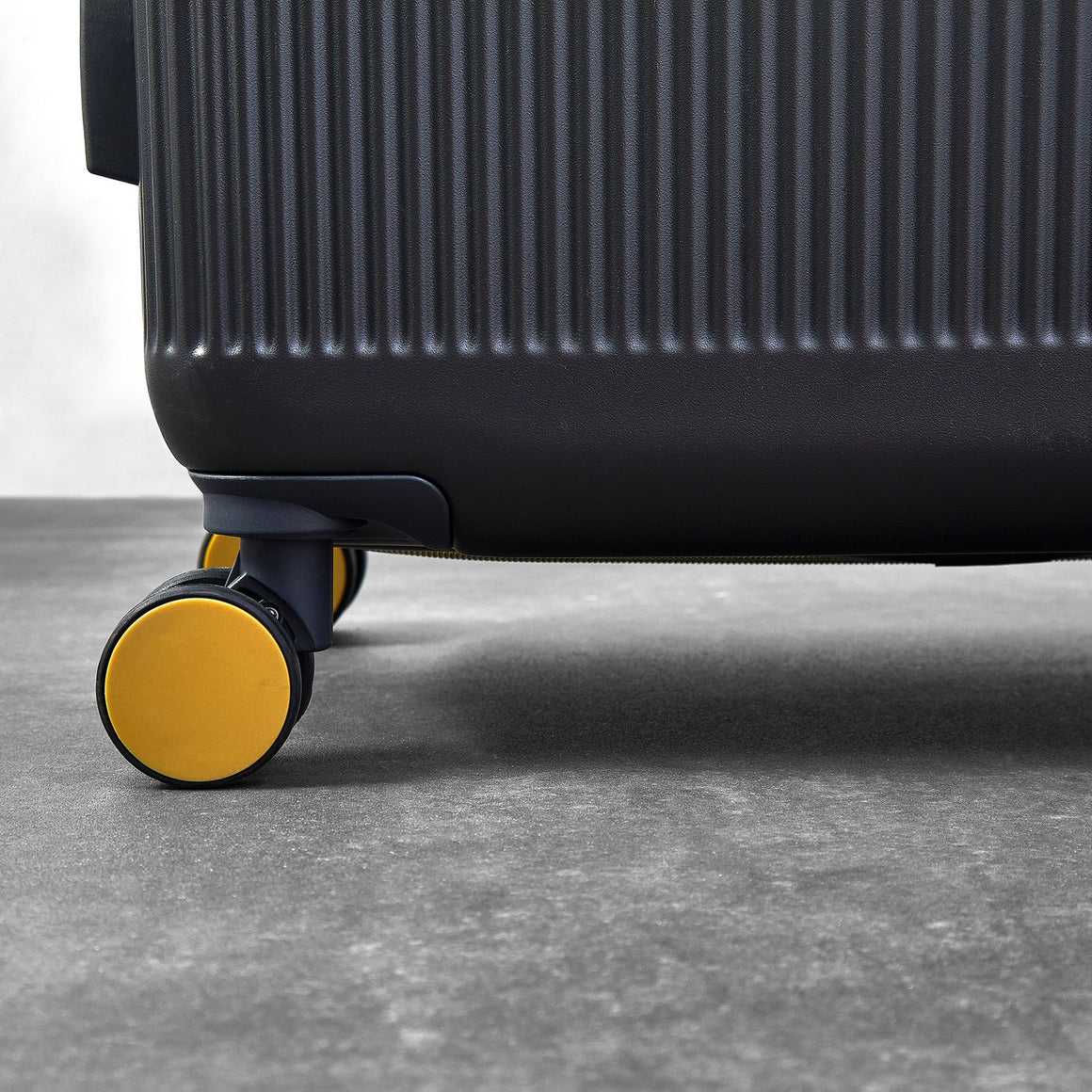 Aria Medium Suitcase in Charcoal + Gold