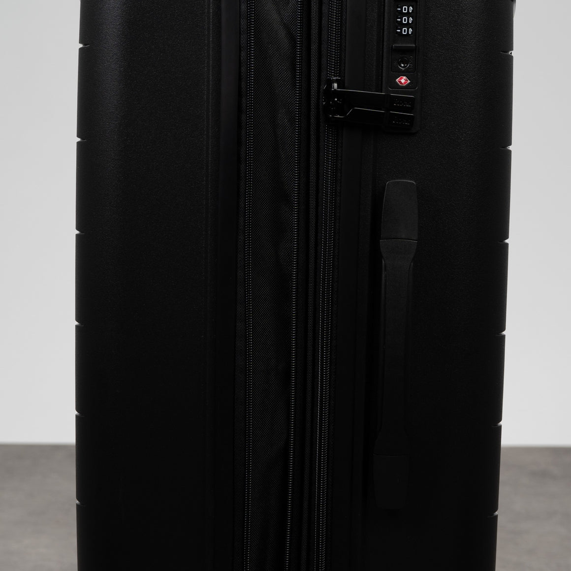 Resilient Medium Suitcase in Black