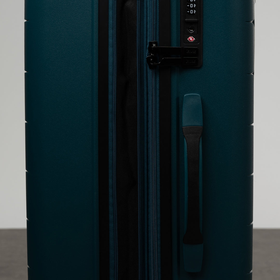 Resilient Large Suitcase in Teal